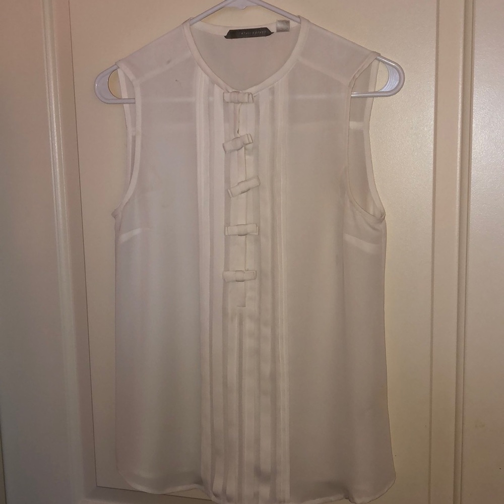 Cream colored button down blouse